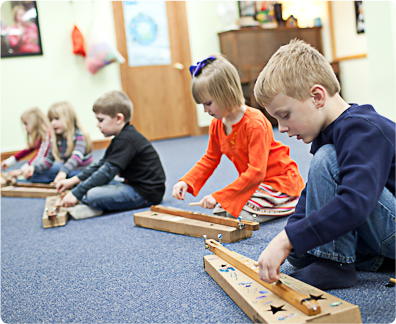 kids playing musical instrument at school