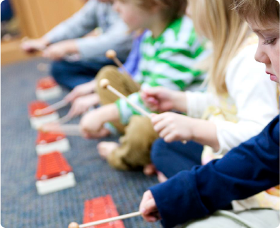 kids playing xylophone