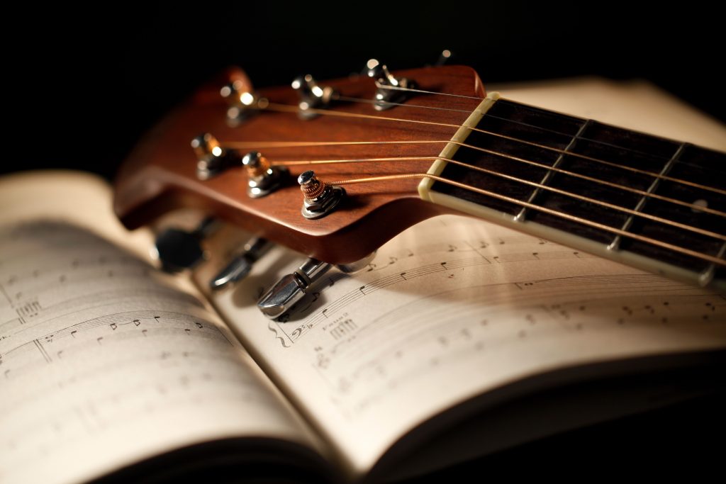 guitar and a musical sheet