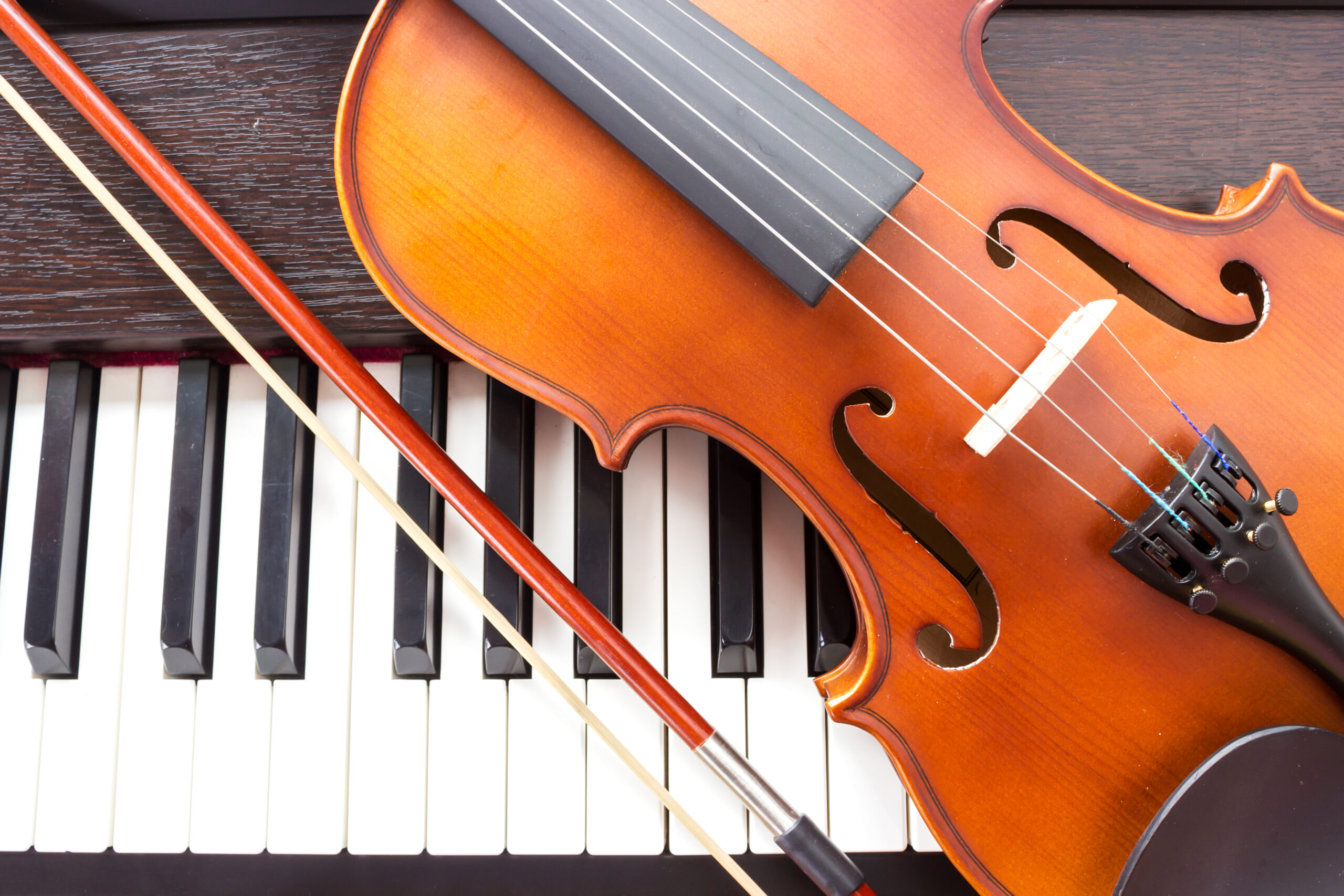 Violin on piano keyboard